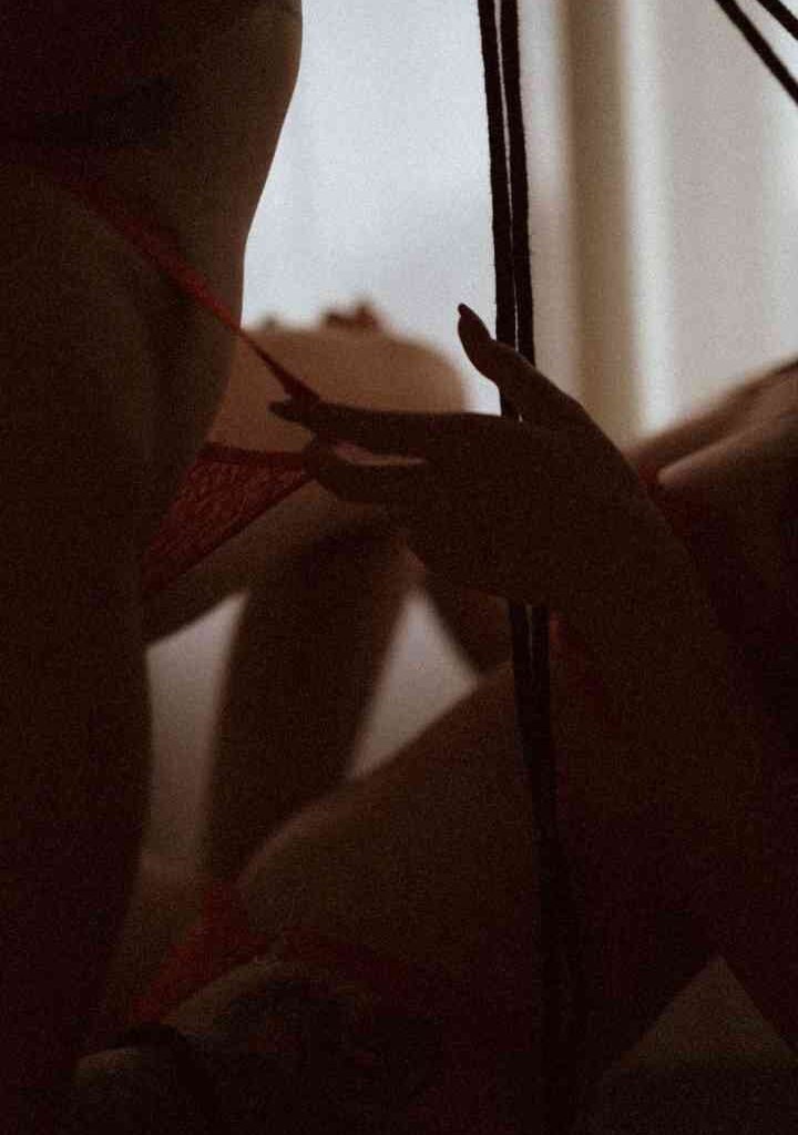 KL Escort Girl Silhouetted figures in intimate embrace, hinting at a passionate encounter. Malaysia Escort Sex in Kuala Lumpur